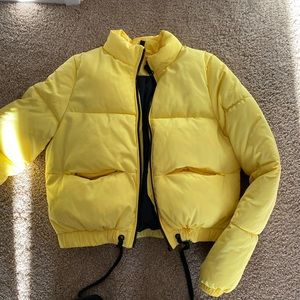 Yellow puffer jacket